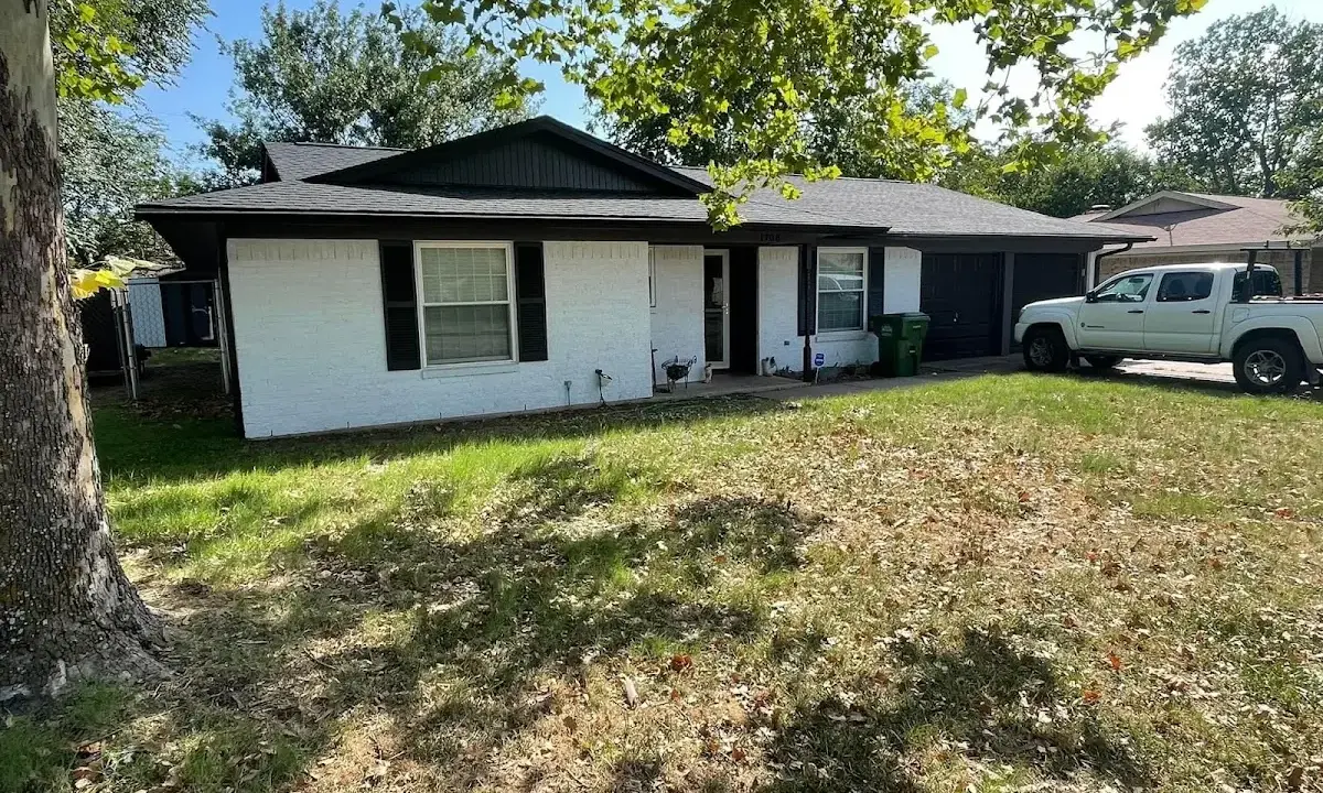 Professional roofing crew working on a residential roof in York